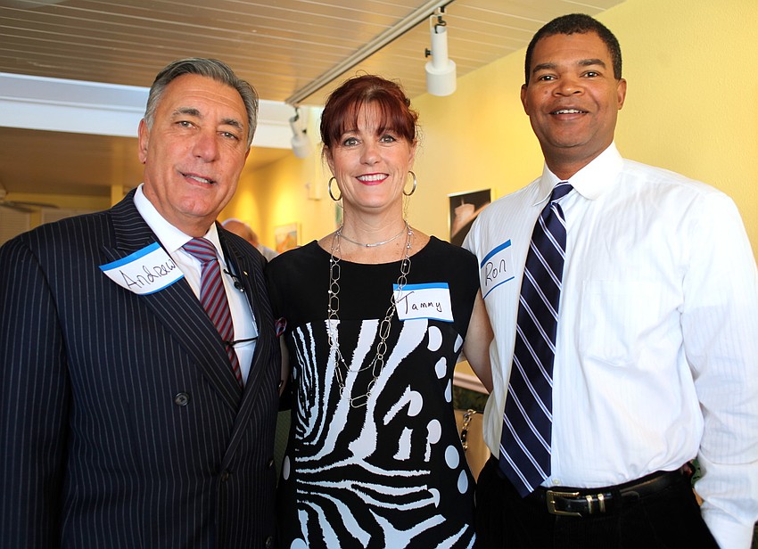 Andrew Vac, REMAX Alliance Group, Tammy Halsted, St. Armands Travel, and Ron Shields, Economic Recovery Group