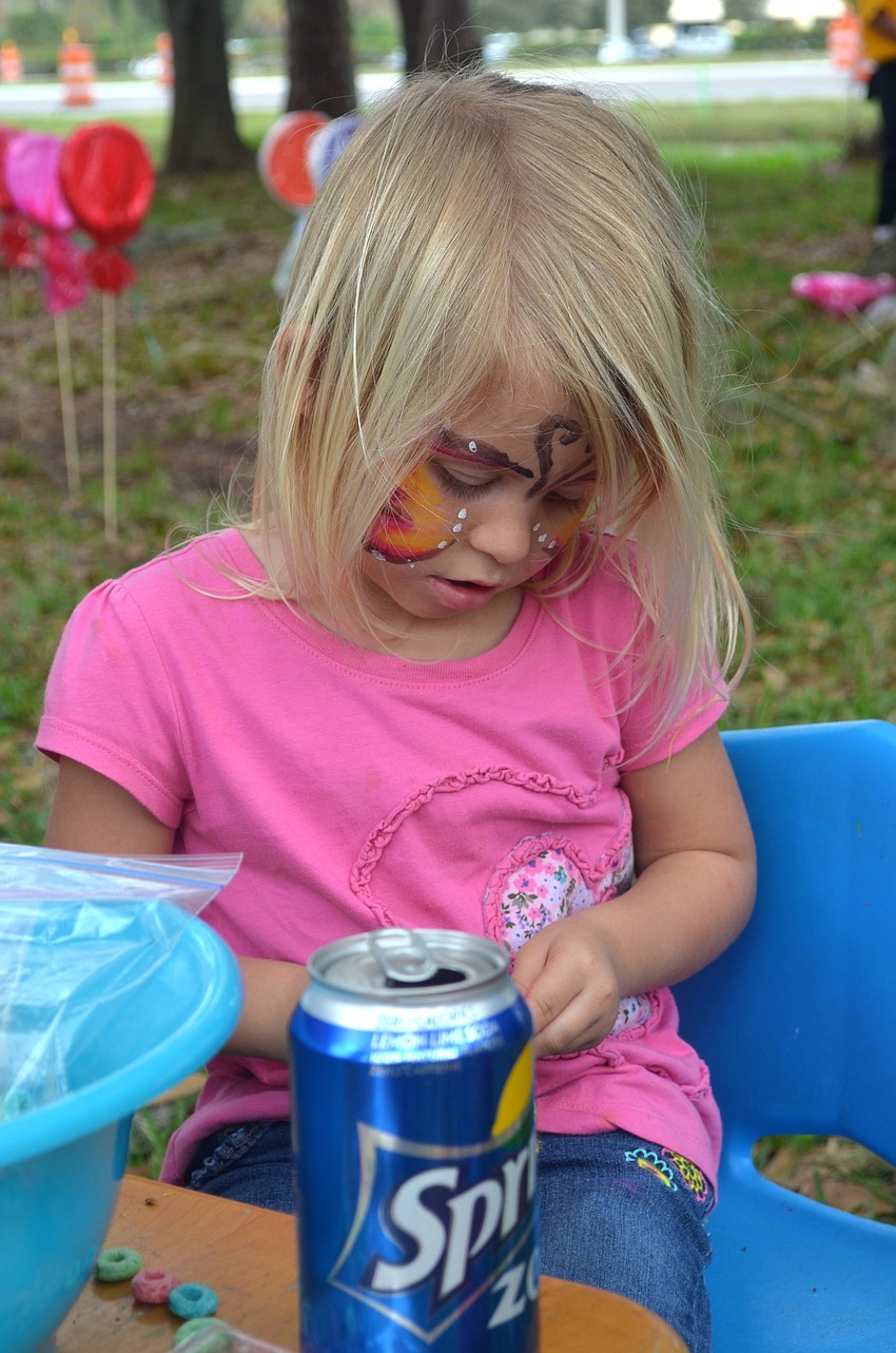 Three-year-old Chloe Munns enjoys a minute to herself.