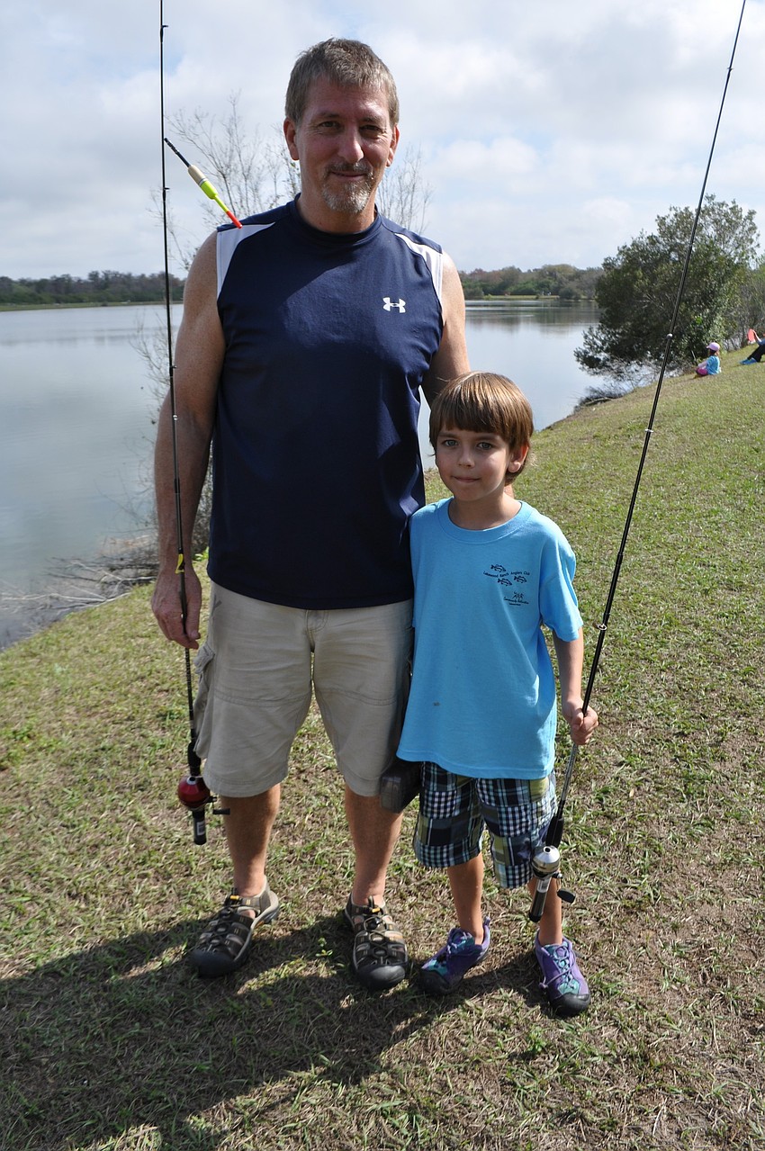 Ken and Jason Quinn take a break to get a snack.