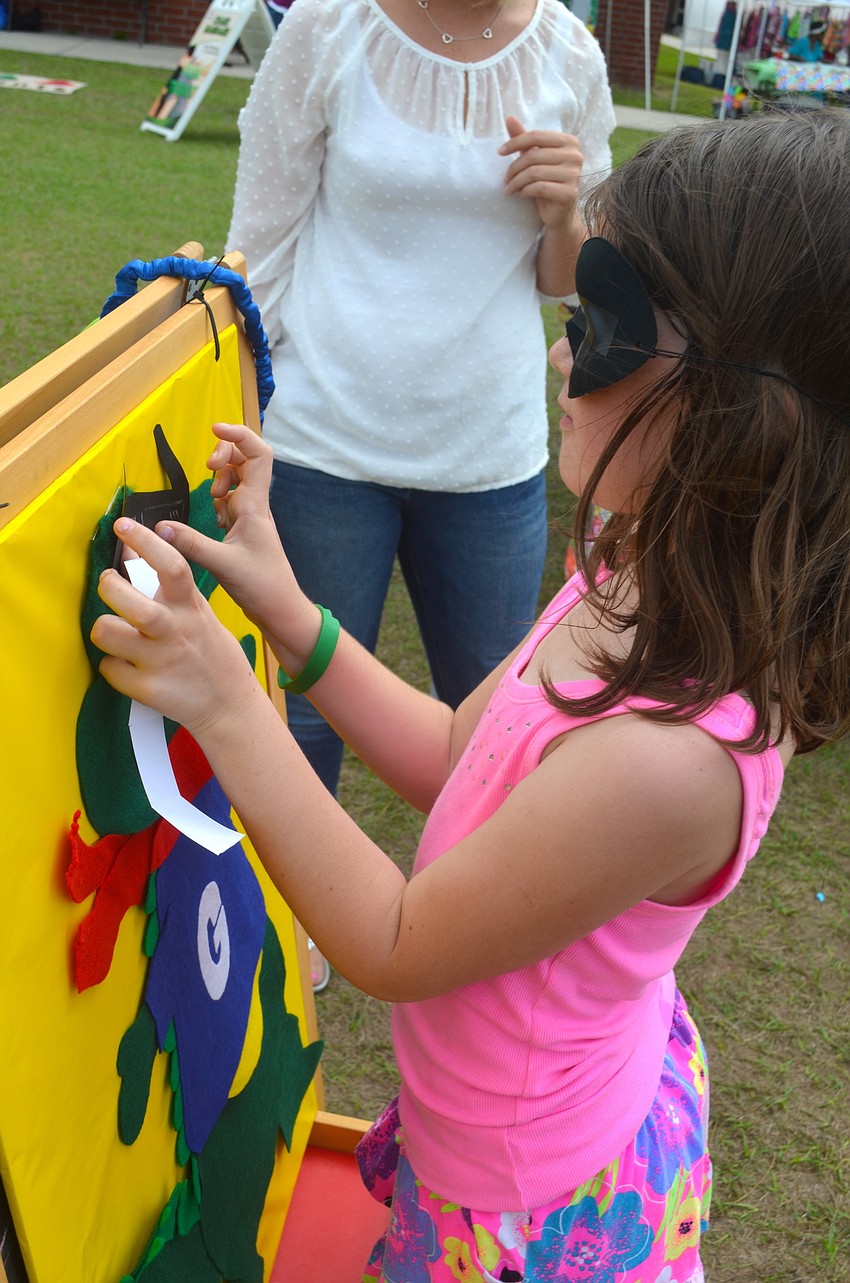 Samantha Jessup, 7, plays a game blindfolded.