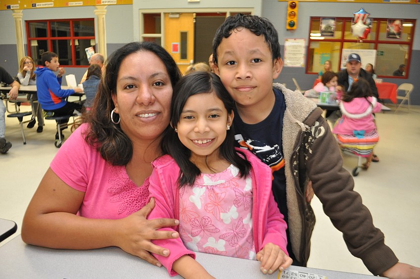 Maria Puente enjoys time with her children, Jade and David Borjas.