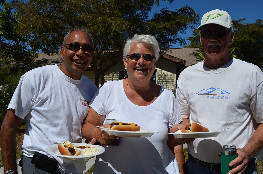 Jason and Christy Deonanan with Bob Cook grab a bite to eat.