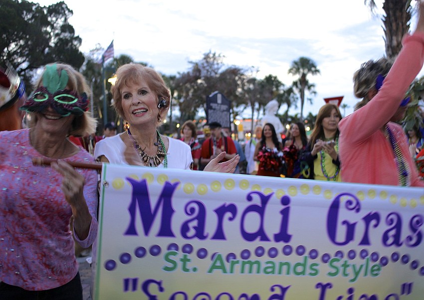 Sue Talkovic and Jeanne Dimido dance at the end of the â€œstrut.â€