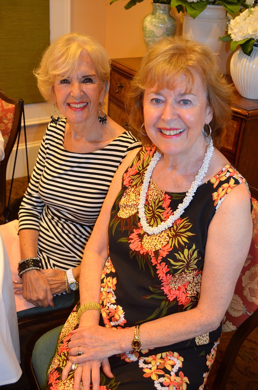 Dee Levi and Grace Becker show off their dresses.