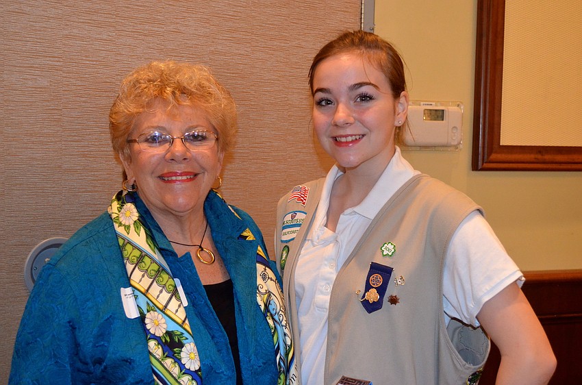 Board Member of the Girl Scouts' Gulfcoast chapter Tracy Lux, with 14-year-old Emily Cruce.