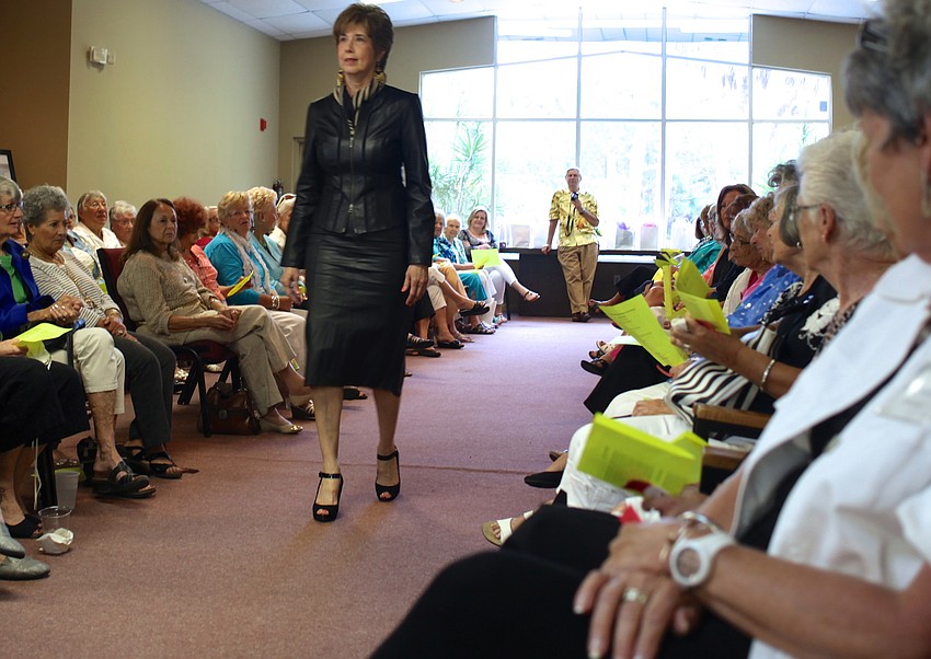 Jan Holman models an all leather outfit for the crowd.