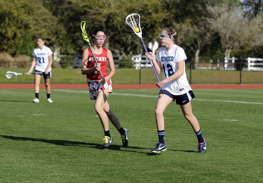 ODAâ€™s Carling Landeche attempts to bring the ball down the field past Cardinal Mooneyâ€™s Noel Turner.