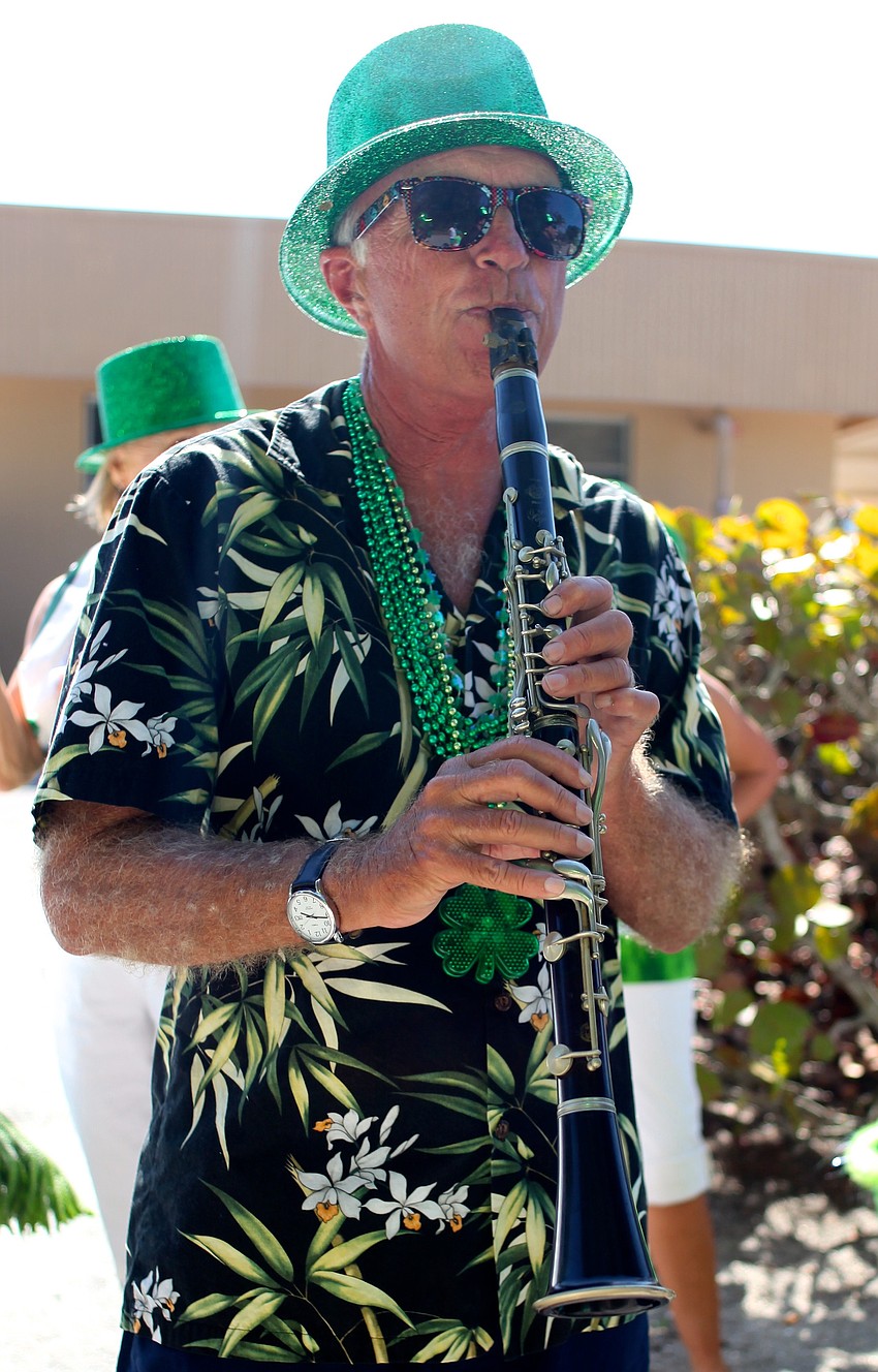 Fred Kagi plays the clarinet during the parade.