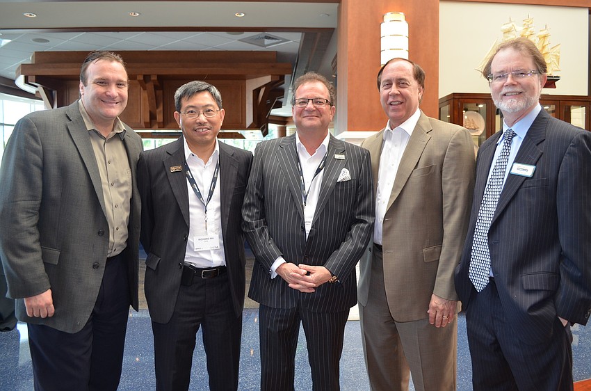 Sean Dunne, Vandyk CFO Richard Ma, CEO John Vandyk, Donald Mincey and Tim Shaw