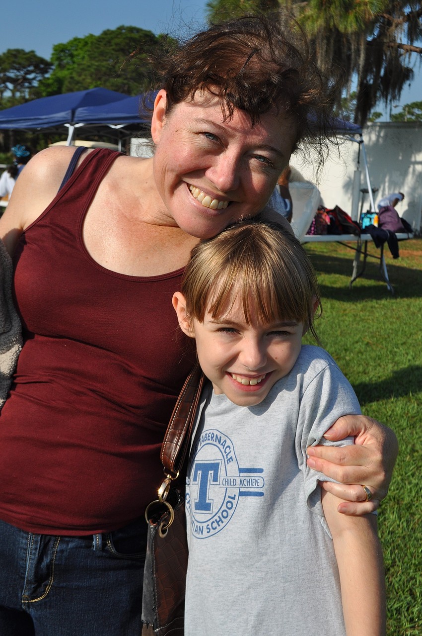 Mary Panagiotou attends to watch her daughter, Hope, compete.