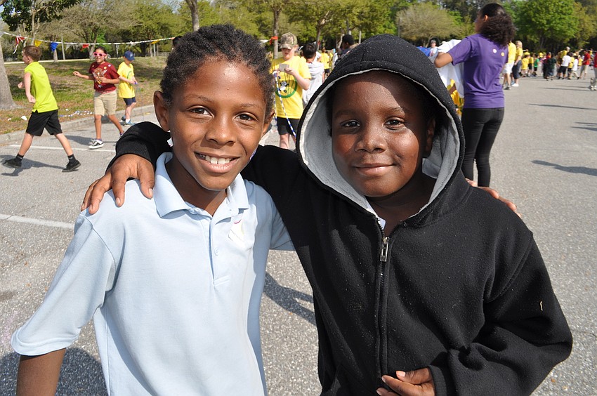 Donnell Amrine and Marcus Mathews enjoy time together.