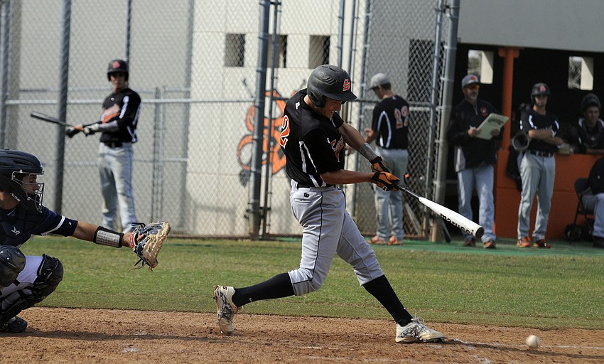 Sarasota High outfielder Skylar Frey makes contact in the bottom of the second inning.