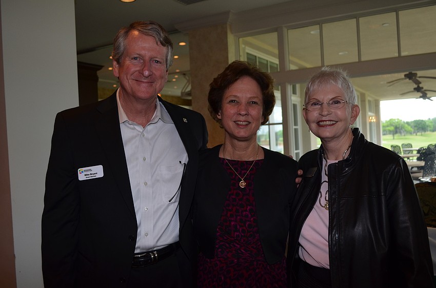 Mike Bryny, Superintendent Lori White and Caroline Zucker