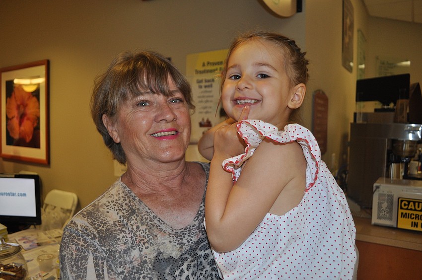 Renee Matthews, with her granddaughter, Brooke Sylvester, 3, whose father, Mark, is a psychiatrist at Comprehensive MedPsych Systems, Inc
