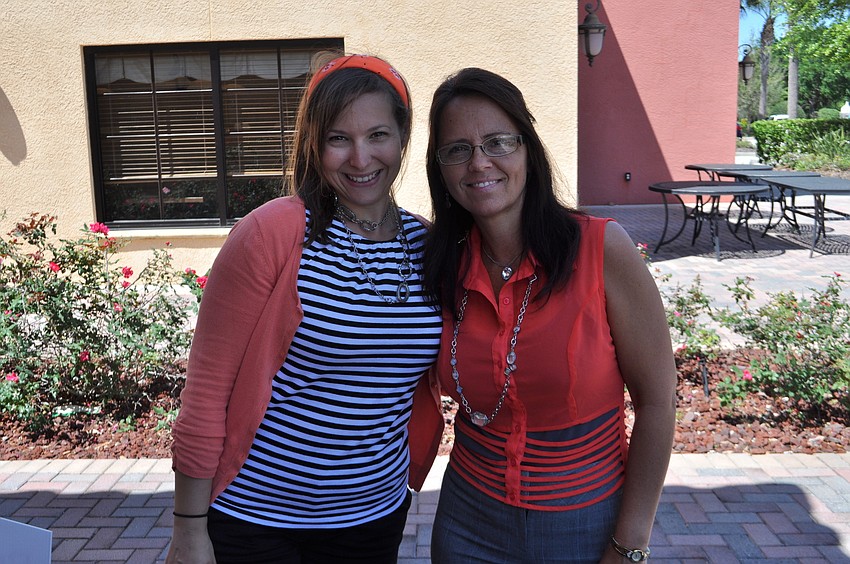 Selah volunteer and Lakewood Ranch resident Mary Kanary and Rhonda Gingerich sell T-shirts and share information about Selah.