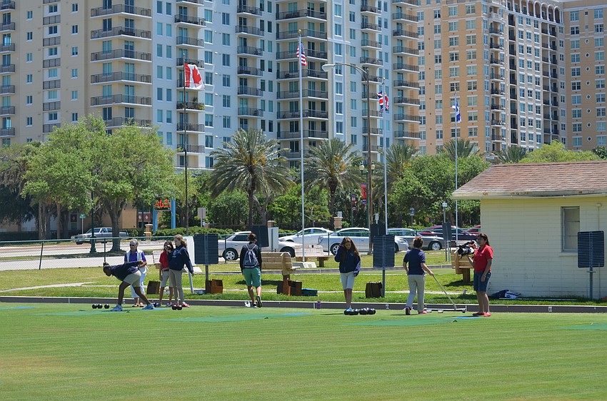 Seventh and eighth grade students play at the Sarasota Lawn Bowling Club.