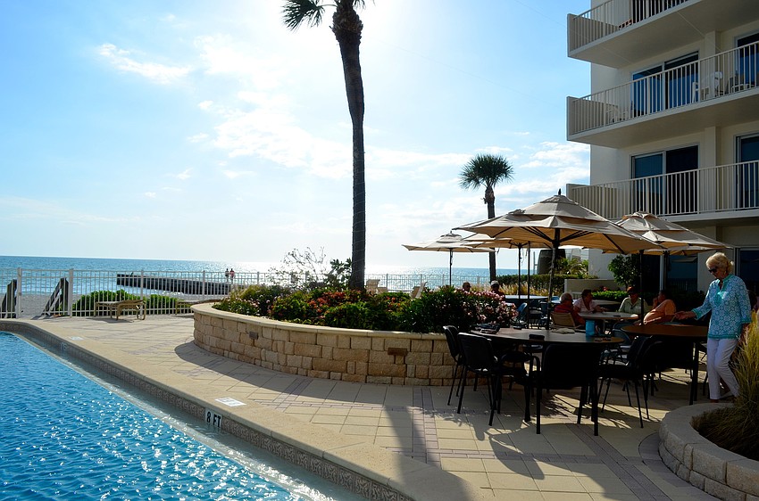 Residents gathered around the pool at the Islander Club.