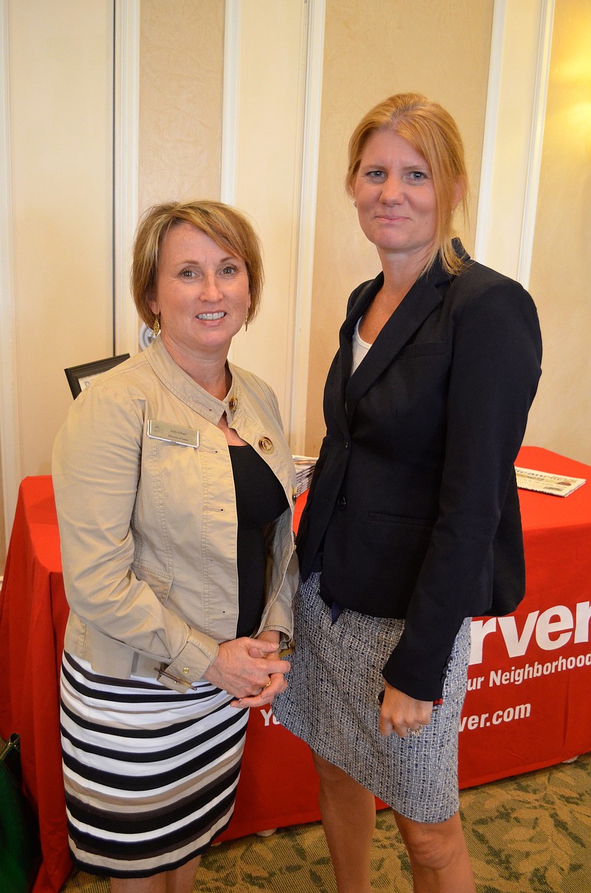 Judy Athari and Cindy Moore have girl time.