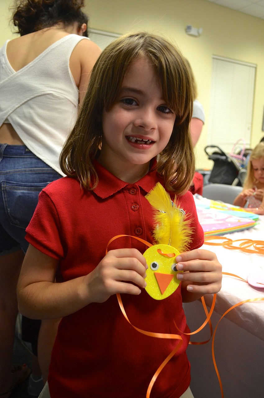 Six-year-old Makayla Murphy shows off a duck she made.