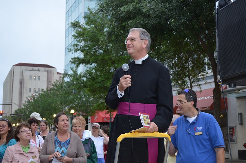 Fr. Fred Robinson welcomes everyone.