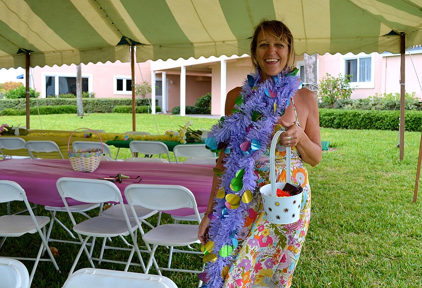 Kathy Oravec, the â€œEaster Queen,â€ prepares the lunch area by the Gulf.