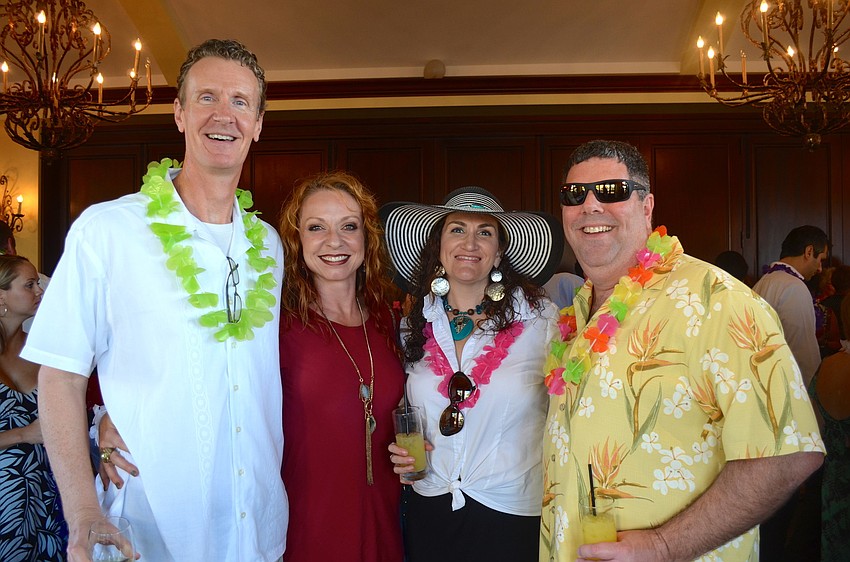 Doug and Tammi VanDyke, Tammi Bradford and Kevin Franzese spend time with friends.