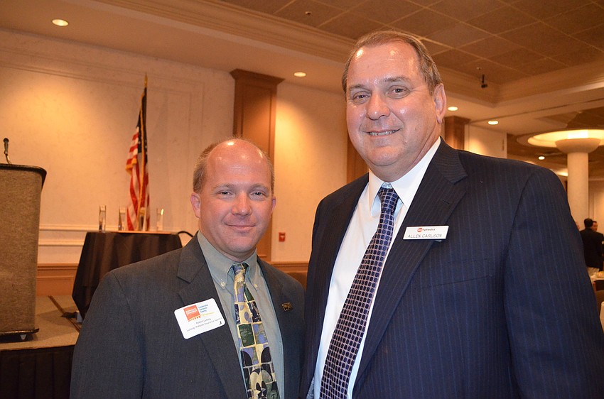 Honorees Robert Ludwig from Leadership Class of 2001 and Allen Carlson from Sun Hydraulics, Corporate Partner of the Year