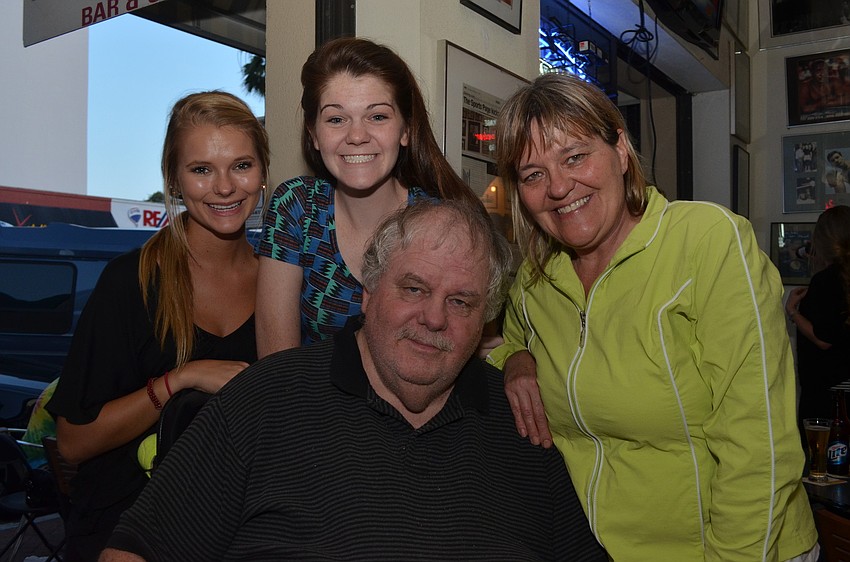 Kara Zellers stands with the Chrystal Hoffman and Chrystalâ€™s parents Harvey and Kim Hoffman.