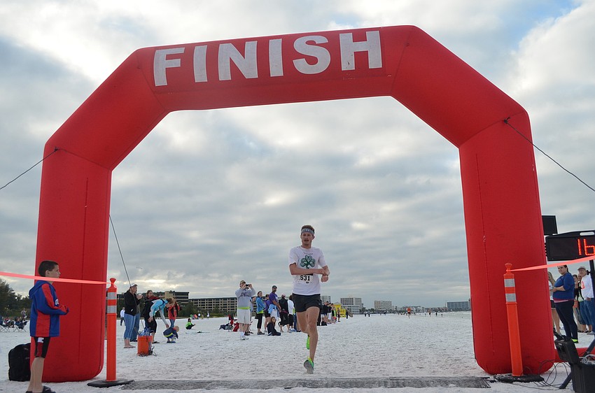 Kevin Smith was the first to finish the 5K with a time of 16:17.