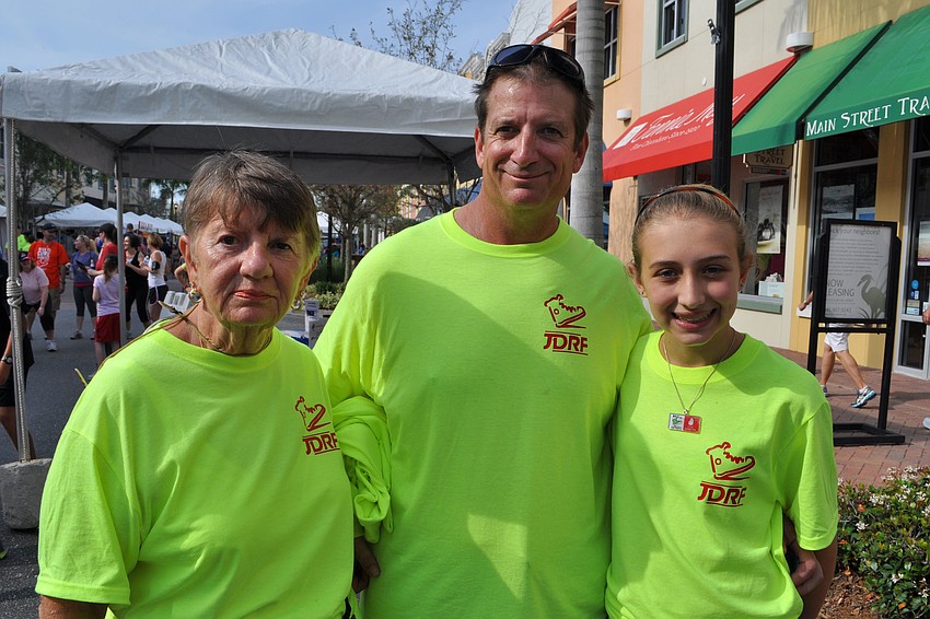 Sandra Porter walked with her son and granddaughter, Bob and Chelsea Porter.