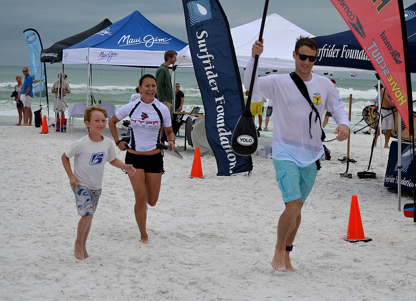 Ben Oteri, his mother, Renee Oteri and John McFarlin complete the race.