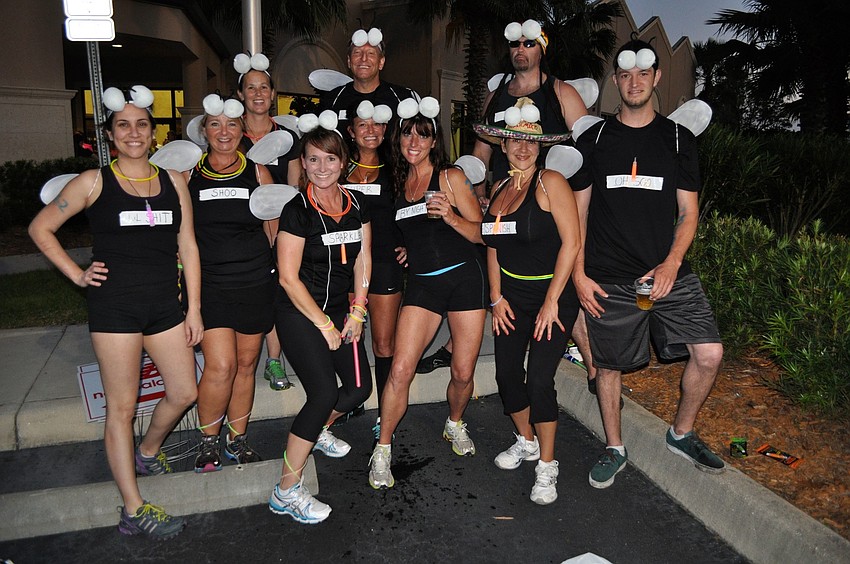 The Bar Flies won for best Glow Costume.