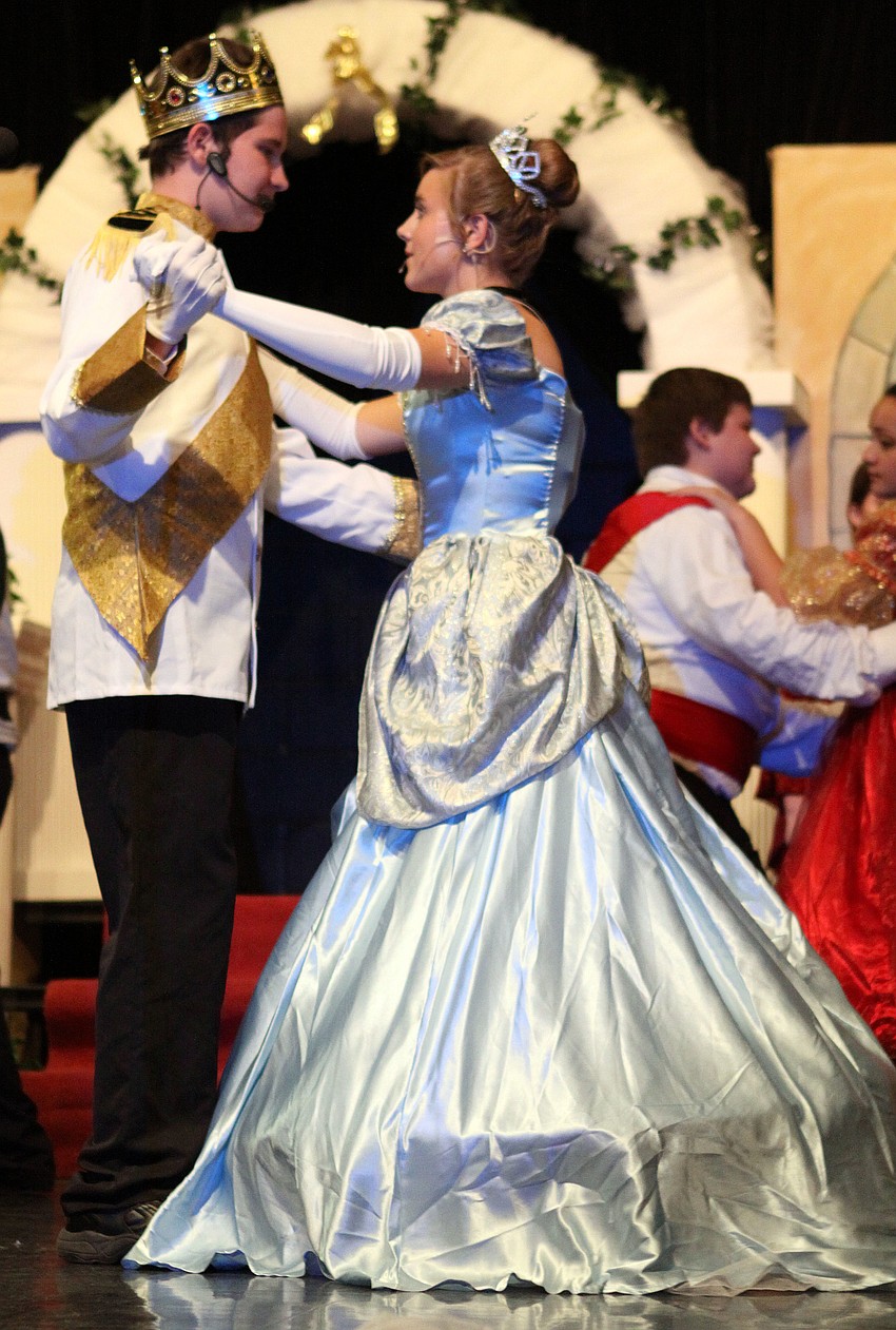 Prince, Kyler Inman, dances with Cinderella, Paige Merriman, to â€œTen Minutes Agoâ€.