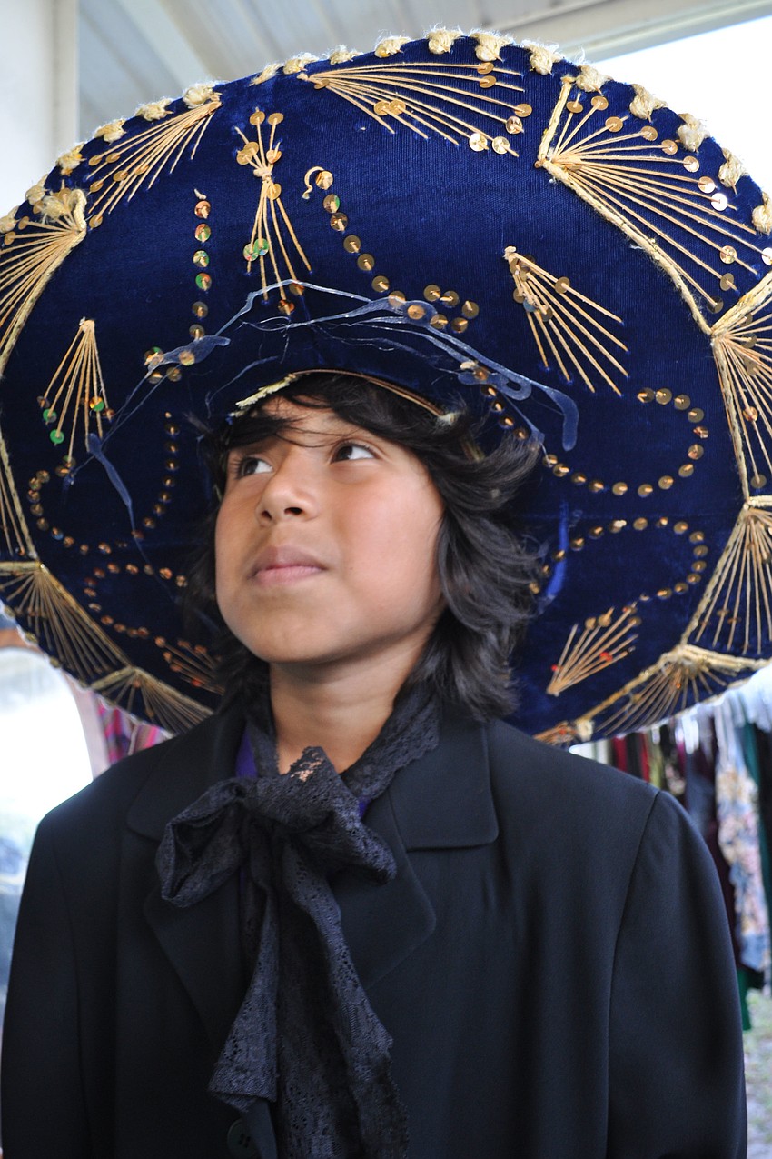 Nicholas Alvarez, a fourth grader, dressed a mariachi band member.