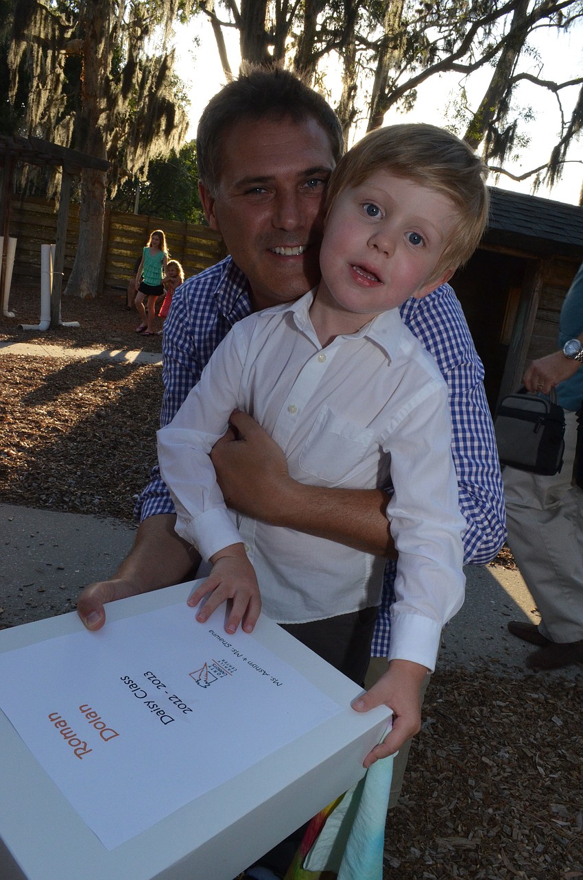 Trevor Dolan and his son Roman