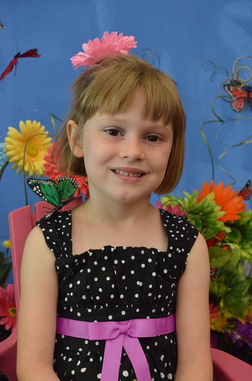 Noelle Tenaglia sang beautifully with her classmates during their performance in the parish hall.