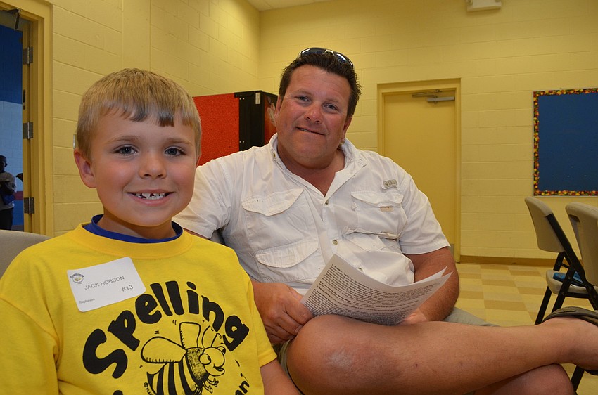 Third grader Jack Hobson came to the spelling bee with his father Paul.