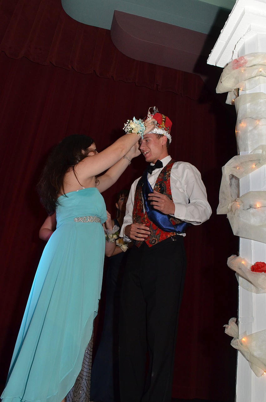 The Prom Committee crowns Josh Palmer king.