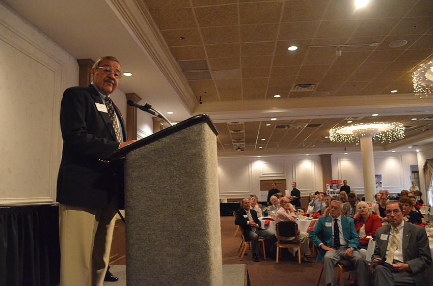 Retired Lt. Col. of the United States Marine Corp Earl Jacobson asked all of the wives of veterans to stand and be recognized for their support and understanding of their military husbands.