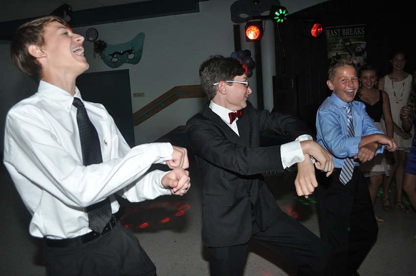 Dylan Wilder, Evan Schuman and Mason Rademaker got the dancing started with bold moves.