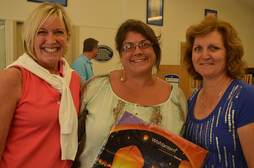 Assistant to the Athletic Director Mary Beth Speaker, Lisa Peirce and Resistor Mary Ann Muller