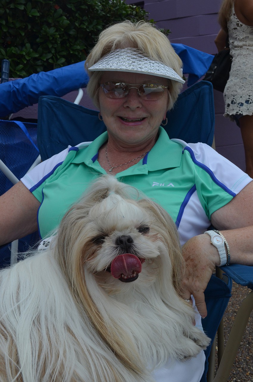Nancy Russell enjoyed the music with her 6-year-old shih tzu Teddy.