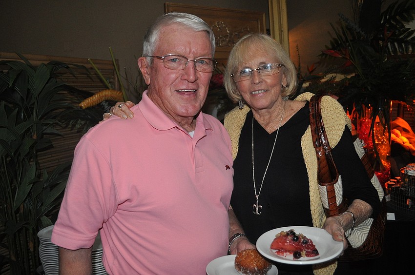 Ken and Sandy McCluskey indulged in the dessert table.