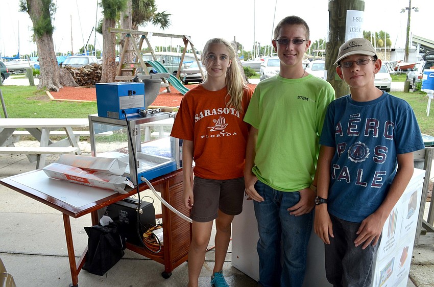 Lauren Hamalian with Reiss Murrell and Erik Murrell