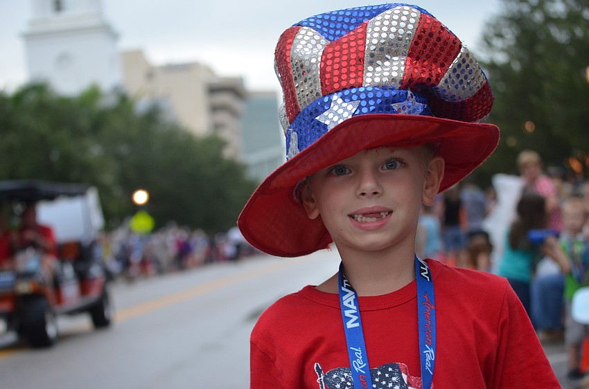 Christian Widener, 7, wears this patriotic hat his father purchased for a Fourth of July Party long before Christian was born.