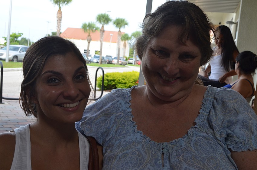 Lauren Russell came to find a dress with her mom Sherry Pourrokny. Russell will marry October 19, 2013.