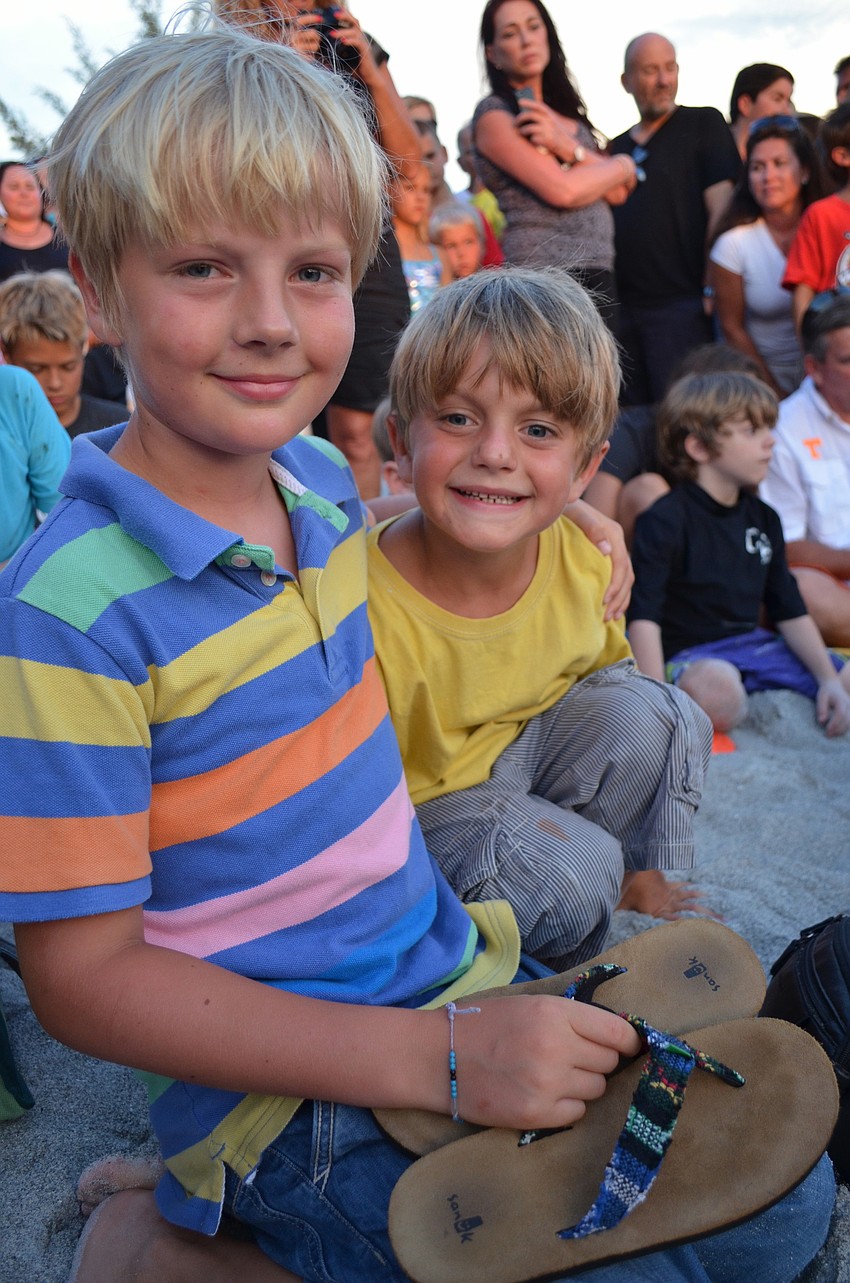 Brothers, Noah and Luca Hounsfield on vacation from England get to experience a sea turtle nest opening for the first time.