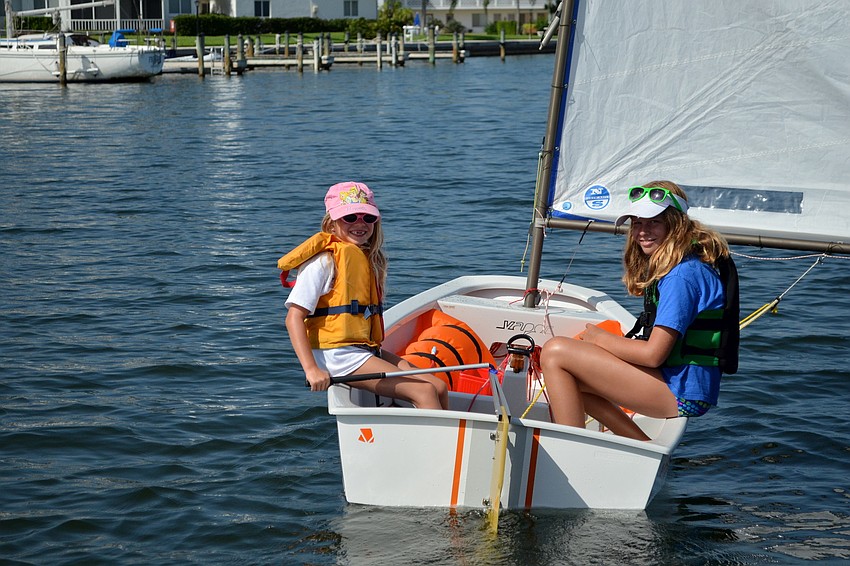 Sisters Katie and Shelby Fulton sail their boat together.