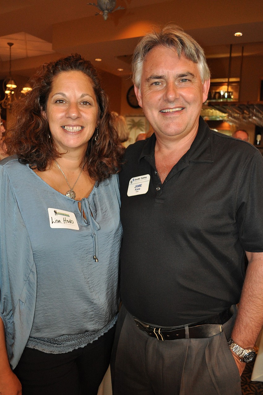 Lisa Hodo, of Elias Promos, with Jamie Kane, of Sandler Training