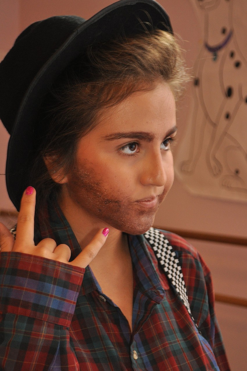 Lakewood Ranch High School junior Kristen Mendez answers a call about stealing puppies for Cruella de Vil.